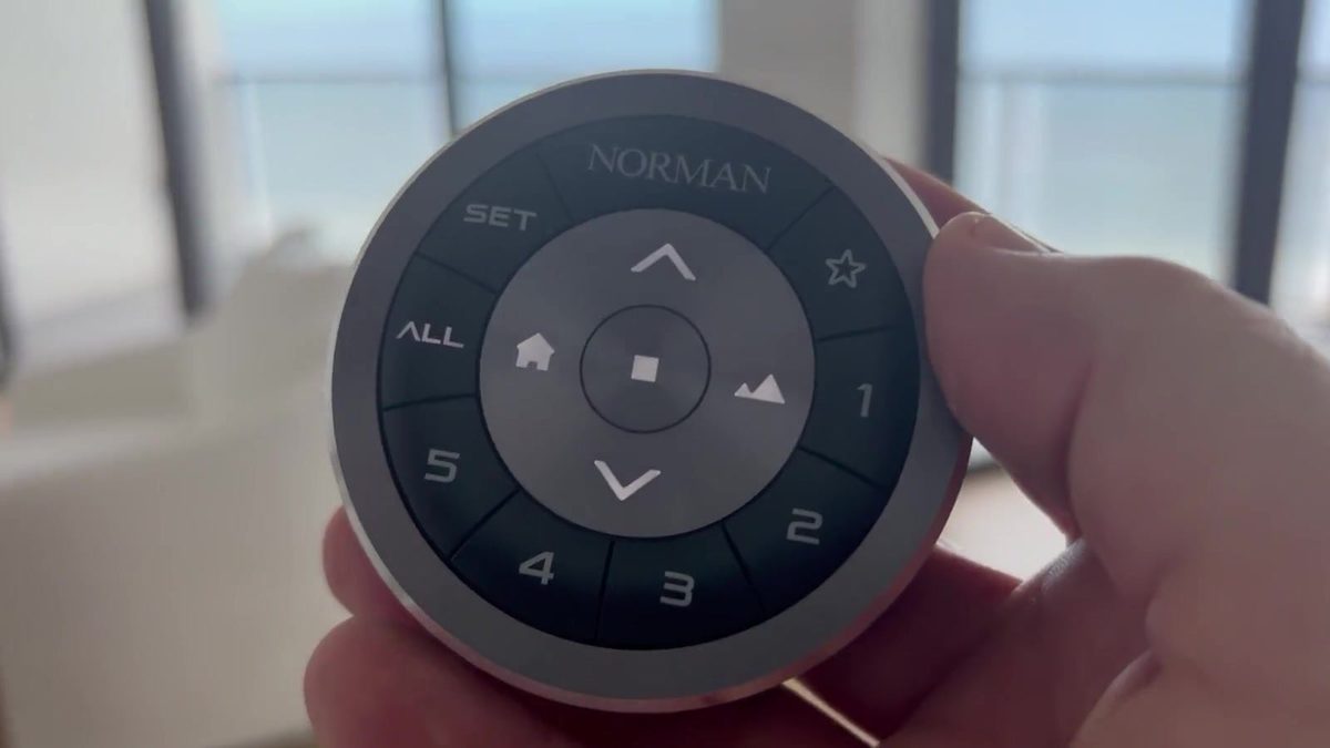 Norman remote operating motorized shades in an oceanfront room