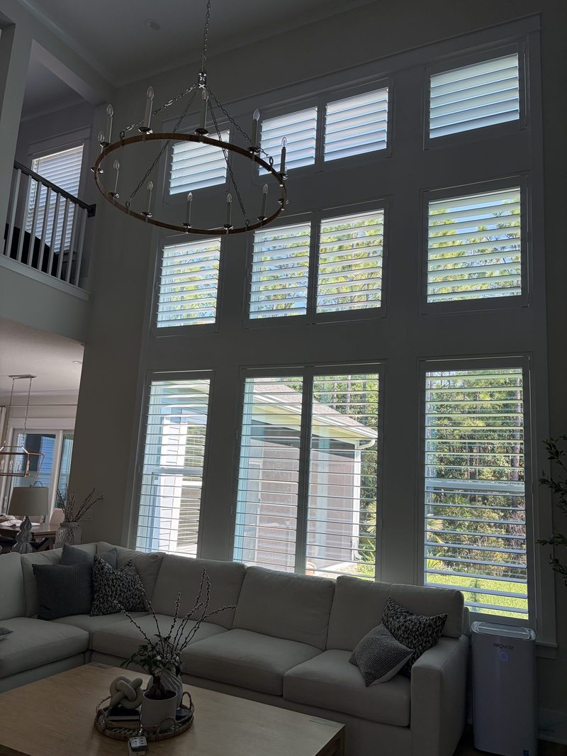 Plantation shutters on two-story windows
